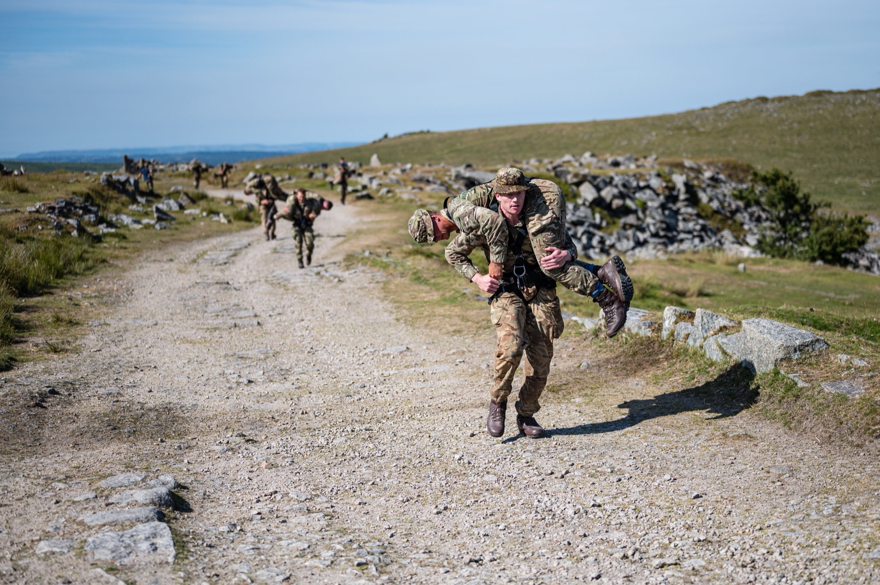 Carrying a load over the moor on a military course